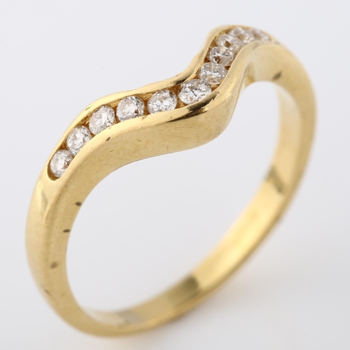 358 - An 18ct gold diamond wishbone ring, channel set with modern round brilliant-cut diamonds, setting he... 