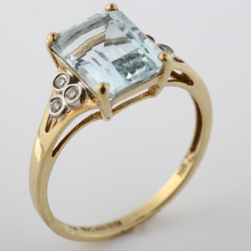 363 - A 9ct gold aquamarine and diamond dress ring, setting height 10.4mm, size P, 2.5g