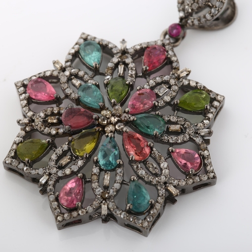 369 - A modern vari-hue tourmaline and diamond flowerhead pendant, set with pear-cut tourmalines and rose-... 