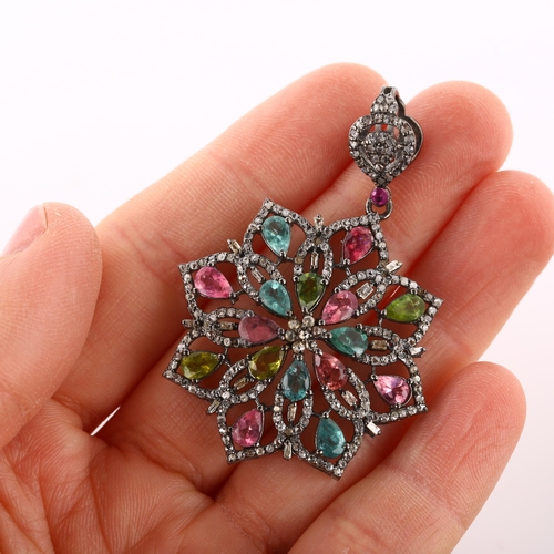 369 - A modern vari-hue tourmaline and diamond flowerhead pendant, set with pear-cut tourmalines and rose-... 