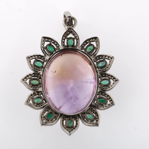 370 - A modern amethyst emerald and diamond cluster flowerhead pendant, set with 38.4ct oval cabochon amet... 