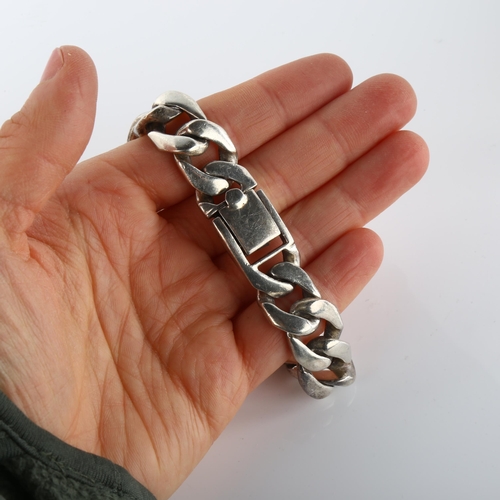 375 - A heavy silver flat curb link bracelet by Richard Fox, band width 14.7mm, bracelet length 22cm, 86g