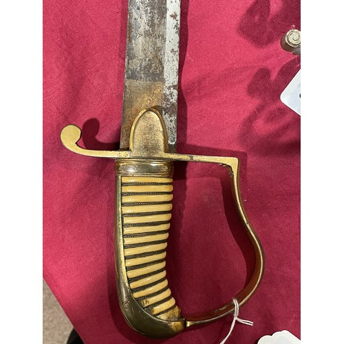 1223 - An early 19th Century cavalry sword with etched blade, length 87cm