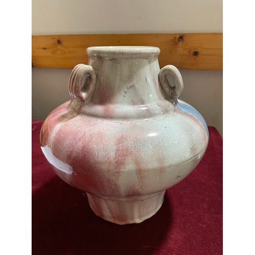 1197 - A Chinese red mottle glaze pot with neck rings, height 24cm