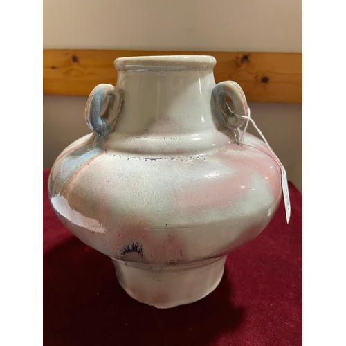 1197 - A Chinese red mottle glaze pot with neck rings, height 24cm