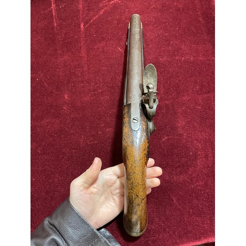 1160 - An early 19th century brass-mounted flintlock pistol, overall length 40cm