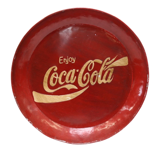 129 - A modern painted aluminium circular tray, embossed Coca Cola, diameter 53cm