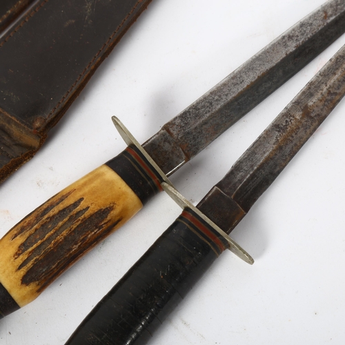 143 - 2 Second World War period daggers in sheaths, both with makers marks William Rodgers, Sheffield, lon... 