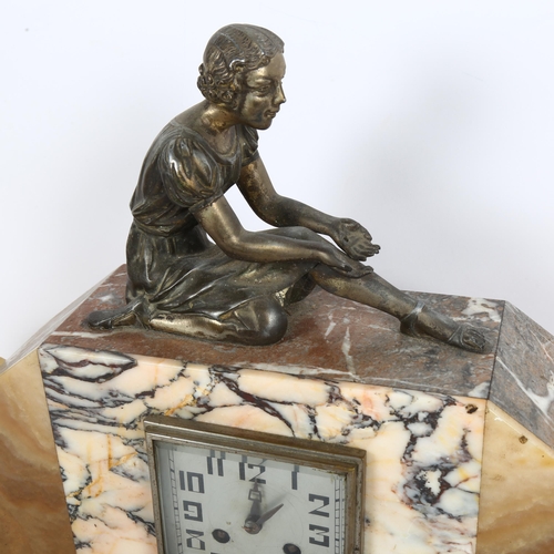 186 - An Art Deco marble clock garniture, with 8-day movement surmounted by a maiden, height 35cm