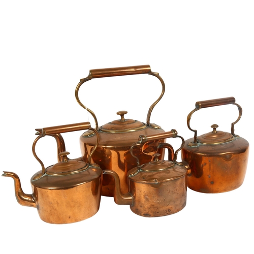 188 - A graduated set of 4 Victorian brass and copper kettles, tallest 34cm