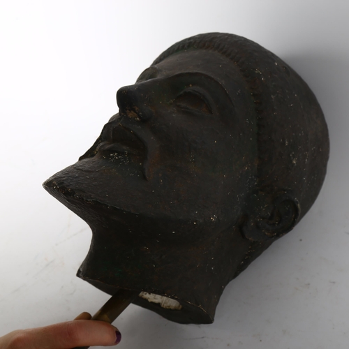 191 - A painted plaster bust of a hoplite, height 28cm