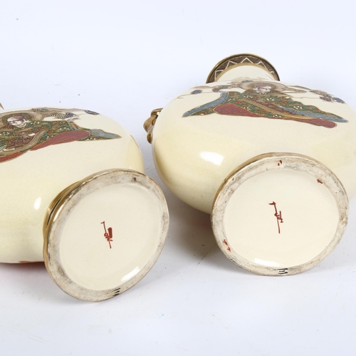 201 - A pair of Japanese cream ground moon flasks, with gilded dragon handles, height 32cm