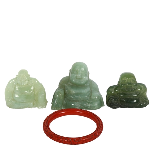 202 - 3 nephrite/green stone Buddhas, tallest 6cm, and a cinnabar bangle