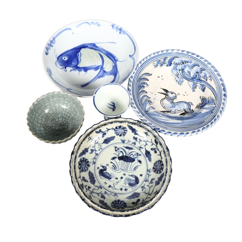 205 - A group of 4 Chinese blue and white bowls and dishes, and a stem cup, and another