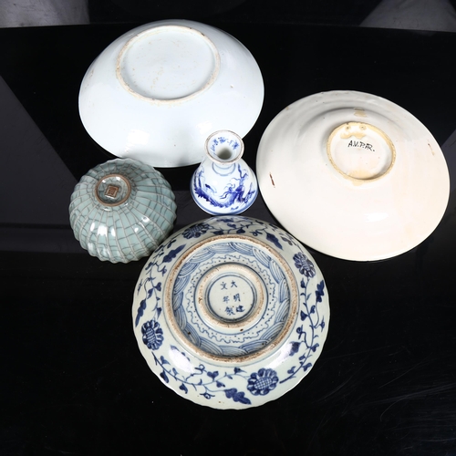 205 - A group of 4 Chinese blue and white bowls and dishes, and a stem cup, and another