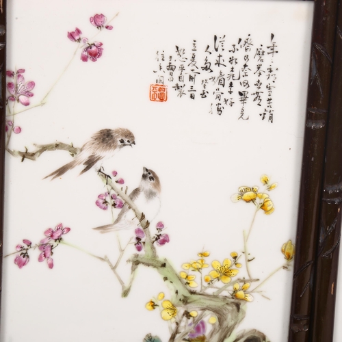 214 - A pair of Chinese porcelain plaques, with enamelled decoration of blossom and exotic birds, in faux ... 