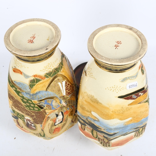 222 - A pair of hexagonal Japanese Satsuma vases on stands, with gilded figural decoration, vase height 32... 