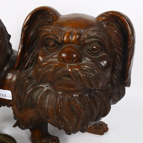 232 - A large carved wood study of a Pekingese dog, length 45cm, and a Vintage fly wisp