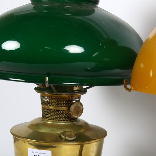 233 - A Super Aladdin brass oil lamp with a green glass shade, height 57cm, and a 21C Aladdin chrome plate... 