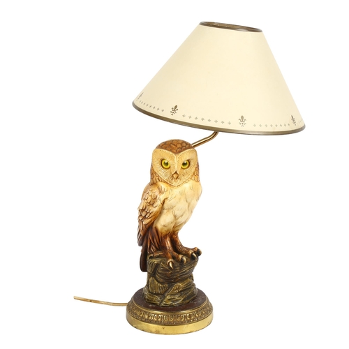 234 - A composition and brass owl design table lamp and shade, overall height 50cm