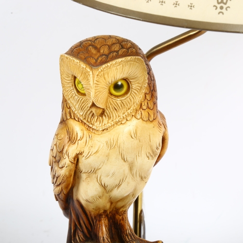 234 - A composition and brass owl design table lamp and shade, overall height 50cm