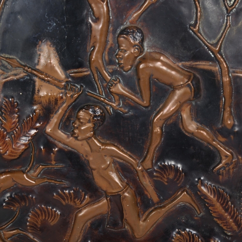 248 - An African embossed copper tray, hunting scene, width 65cm, depth 45cm