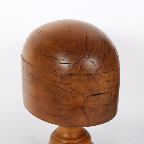 70 - A Vintage milliner's turned yew wood hat block on stand, height 26cm