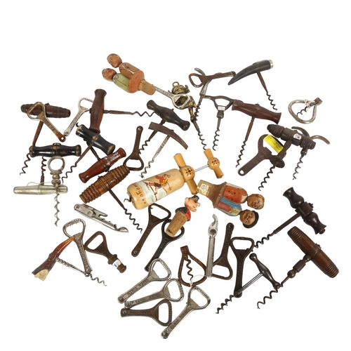 253 - A collection of Vintage corkscrews and bottle stoppers, including some German Black Forest stoppers