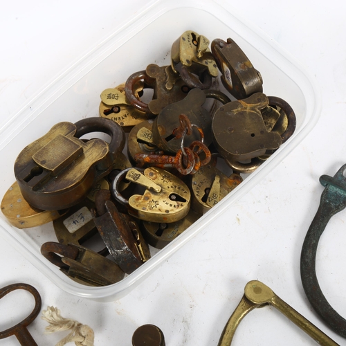 254 - A selection of early 20th century kit bag hasps, Vintage padlocks and keys