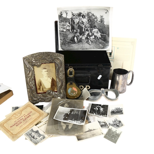 257 - A selection of military ephemera, including a Japanese antimony style floral picture frame, various ... 