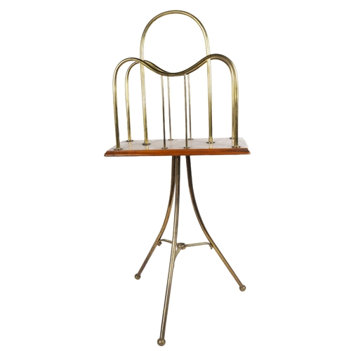 259 - A Vintage rotating magazine rack, height 80cm