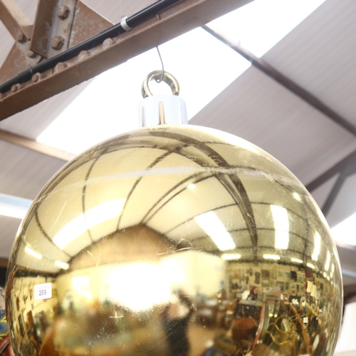 269 - A large decorative Christmas bauble, gold in colour, diameter 52cm