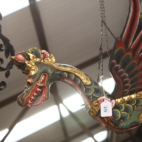 270 - A wooden and hand painted hanging dragon, length 60cm