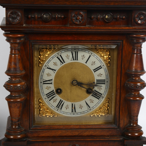 284 - An early 20th century walnut-cased German mantel clock, 8-day movement, silver chapter ring with Rom... 