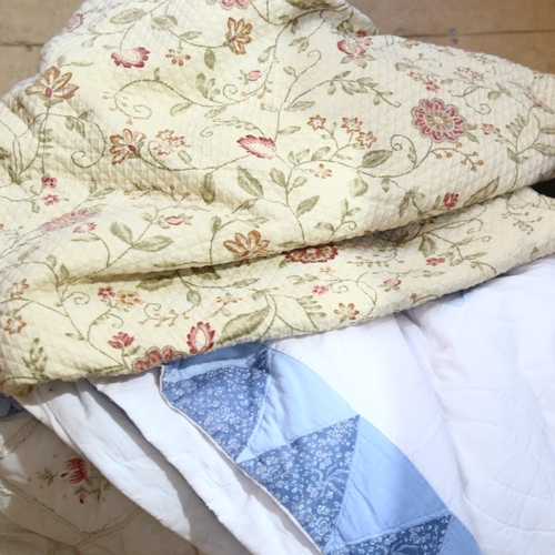 295 - A quantity of Vintage eiderdowns