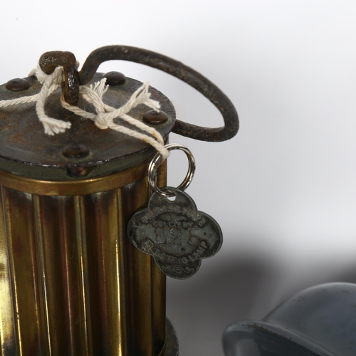 303 - An Antique brass miner's safety lamp, the Premier Lamp Engineering Company Ltd Leeds, a landing buoy... 