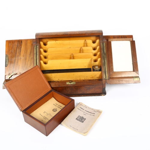 313 - A Victorian burr-walnut stationery box, with inkwell, and a leather storage box with British armoria... 