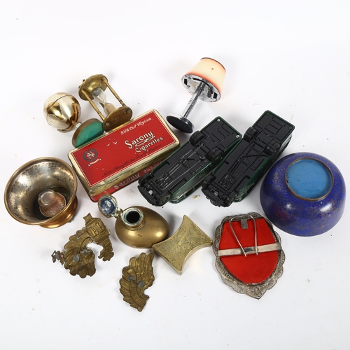 349 - Various brass inkwells, a brass sand timer, a Vintage Sarony Silk Cut cigarettes tin etc