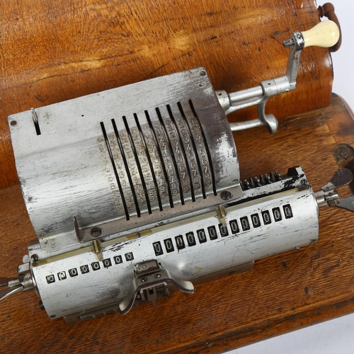 353 - A mid-century mechanical calculator, in original case, length including case 33cm, width 16cm, heigh... 