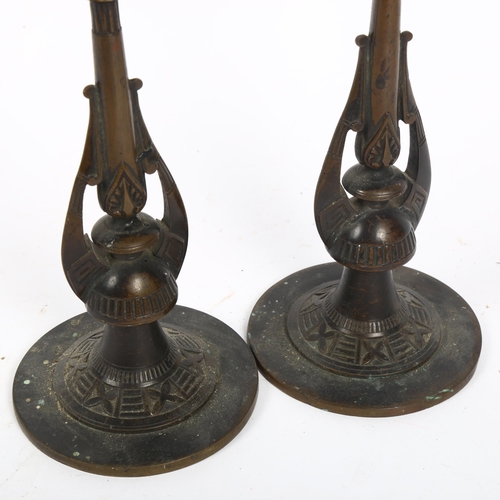 355 - A pair of Egyptian Revival bronze candlesticks, height 24cm