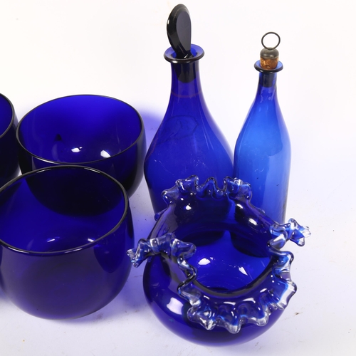 364 - A quantity of Bristol blue finger bowls, a Brandy etched decanter, an oil jar etc, largest height 22... 