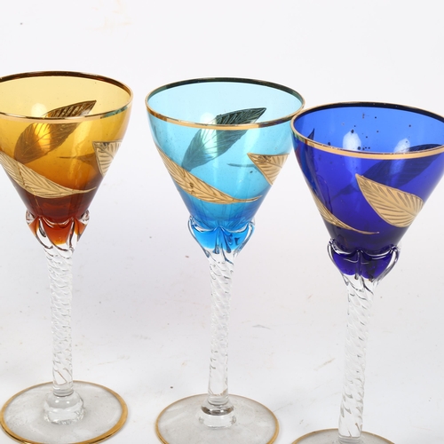 367 - A group of twist stem hi-ball cocktail glasses, with gilt leaf design