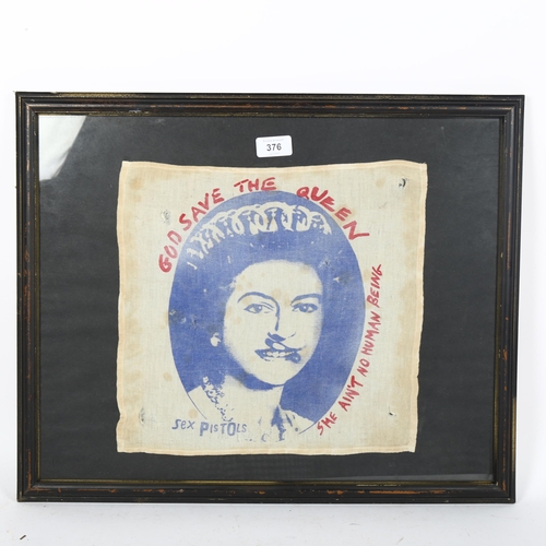 376 - A Vintage framed Sex Pistols God Save The Queen handkerchief, 55cm x 45cm including frame