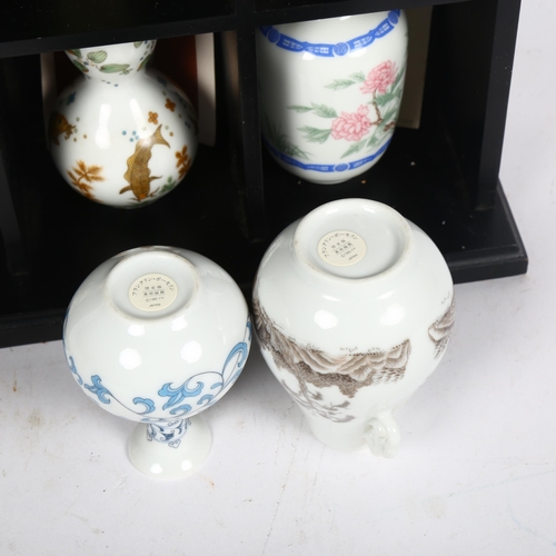 422 - A collection of miniature Japanese and Chinese vases, in fitted display stand, stand height  40cm (1... 