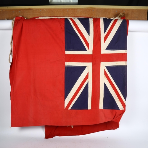 430 - A 20th century British India flag (Heavens light earth), length 180cm, height 85cm, and an early 20t... 