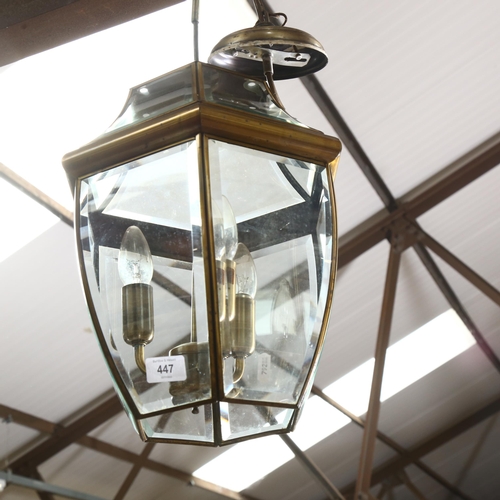 447 - An Antique style brass-framed and bevel-edge hanging lantern, overall length approx. 80cm