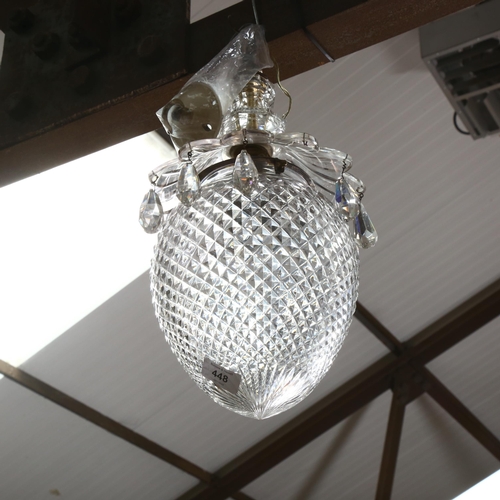 448 - A moulded glass pineapple design pendant light fitting with lustre drops, approx. 45cm