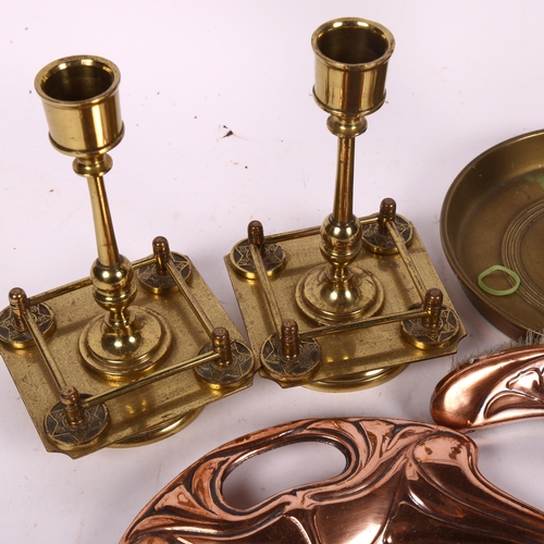 454 - An Art Nouveau copper crumb tray and brush, pair of Antique brass candlesticks, 15cm, and another wi... 