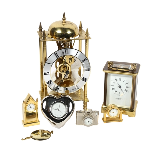 459 - A carriage clock by Taylor & Bligh, a lantern clock and miniature clocks