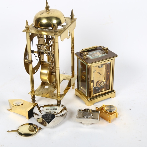 459 - A carriage clock by Taylor & Bligh, a lantern clock and miniature clocks